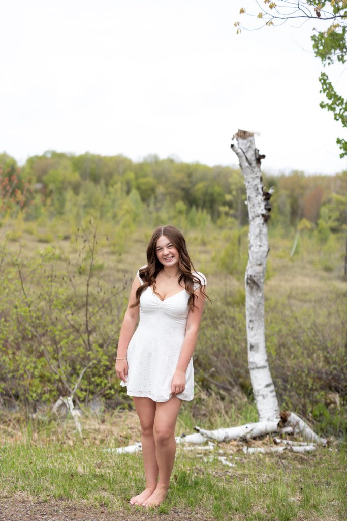 Julia's senior portrait session in Hayward, WI, showcasing natural Wisconsin scenery.