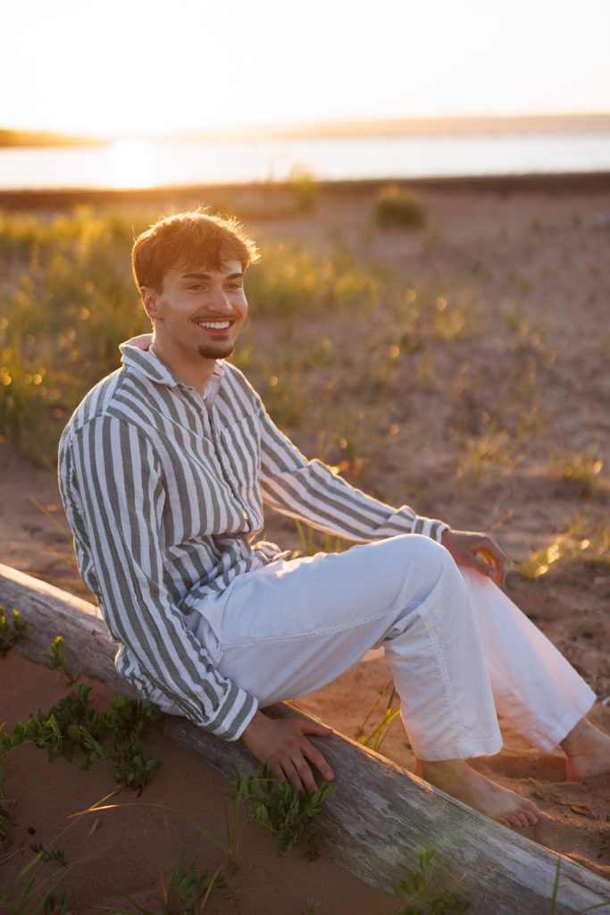 Senior portrait of Jaymeson in Duluth, Minnesota, at sunset.