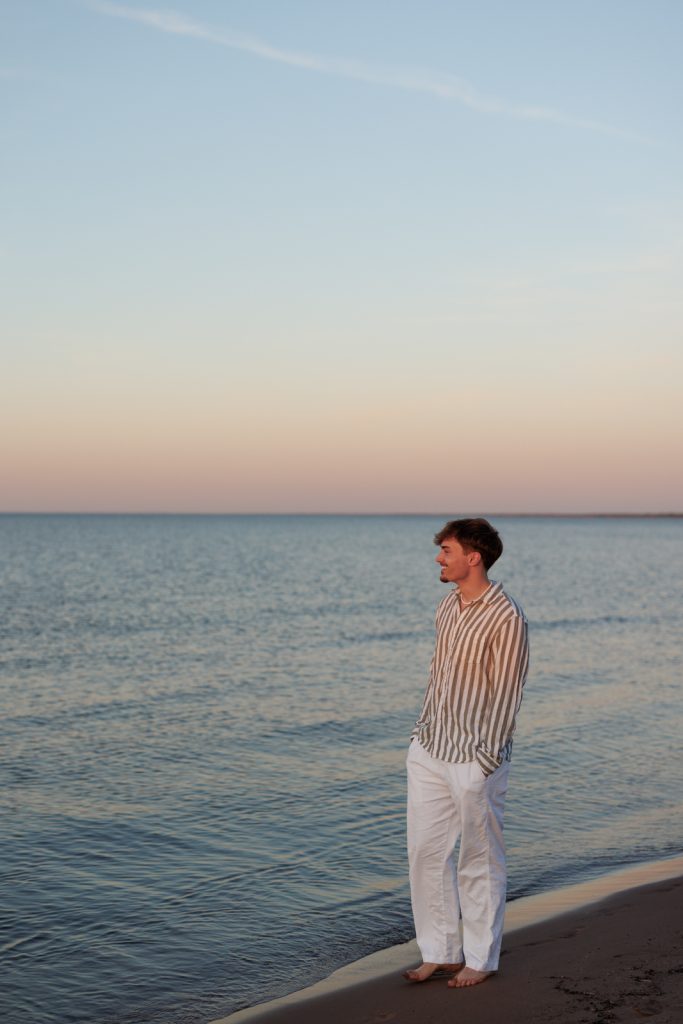 Senior portrait of Jaymeson near Lake Superior, Duluth Minnesota, showcasing senior photography services.