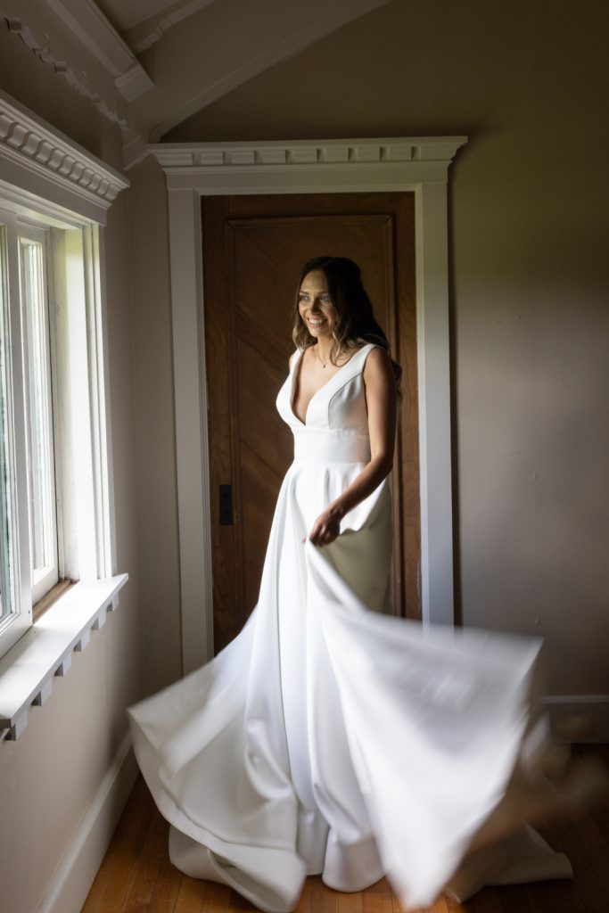 Bride in wedding dress at Stout’s Island Lodge, Birchwood, Wisconsin wedding photography.