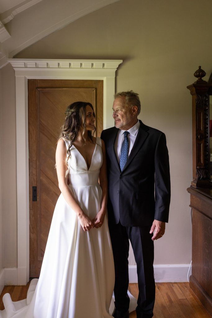 Bride and father sharing a moment at Stout’s Island wedding in Wisconsin.