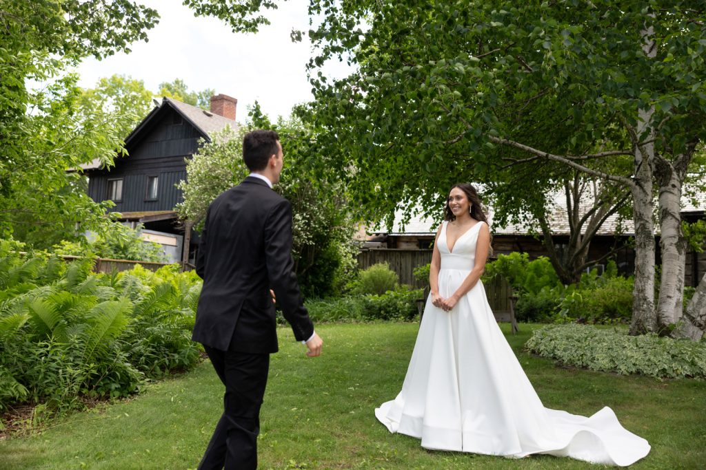 Brittany and Cole wedding couple first look on Stout’s Island, Birchwood, Wisconsin.