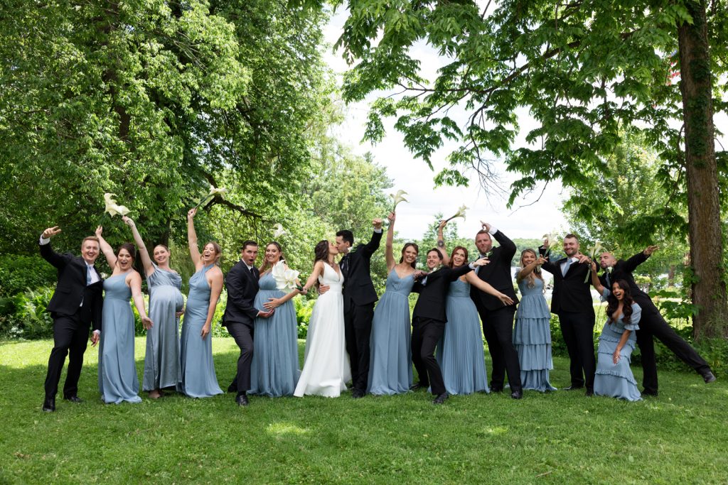 Brittany and Cole wedding party celebrating on Stout’s Island, Birchwood, Wisconsin.