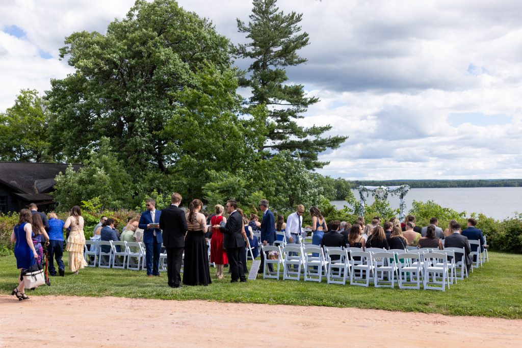 Stout’s Island wedding ceremony overlooking Red Cedar Lake, Wisconsin.