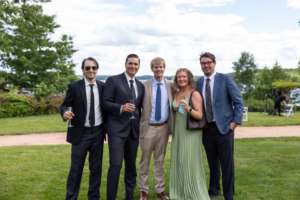 Group of wedding guests celebrating at Stout’s Island wedding in Birchwood, Wisconsin.