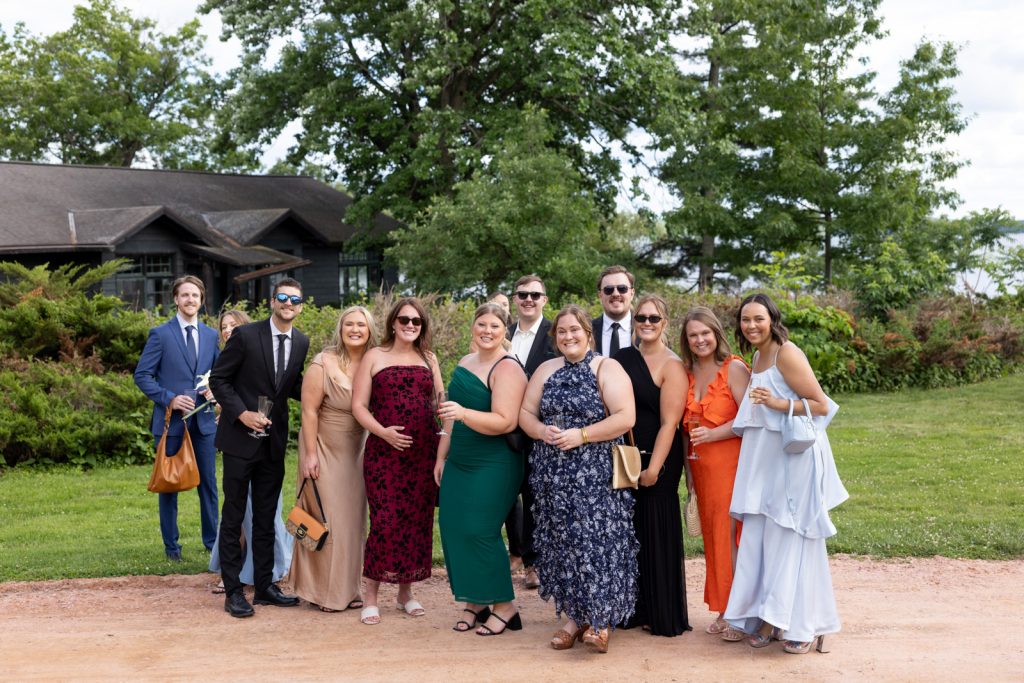 Group portrait of wedding party at Stout’s Island Lodge in Wisconsin.