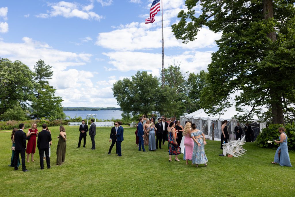 Stout’s Island wedding reception with guests and American flag, Birchwood, Wisconsin.