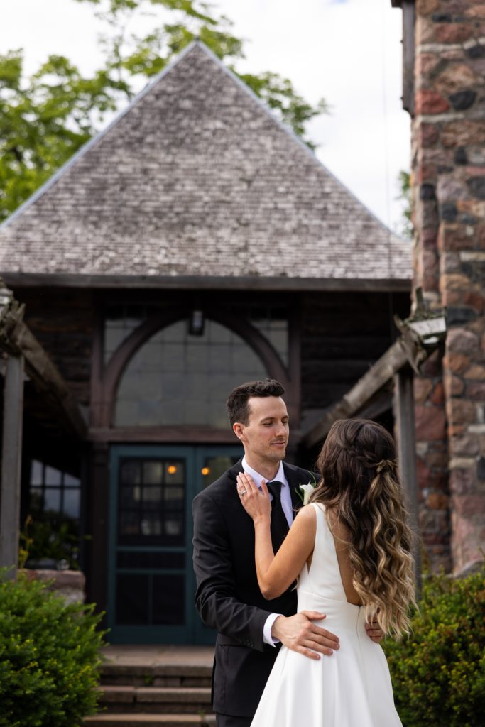 Brittany and Cole sharing a first look at Stout’s Island Lodge, Birchwood, Wisconsin wedding venue.