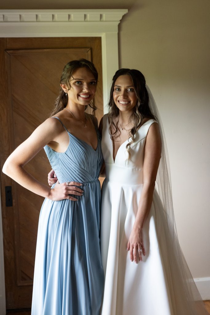 Bride and bridesmaid portraits at Stout’s Island wedding in Birchwood, Wisconsin.