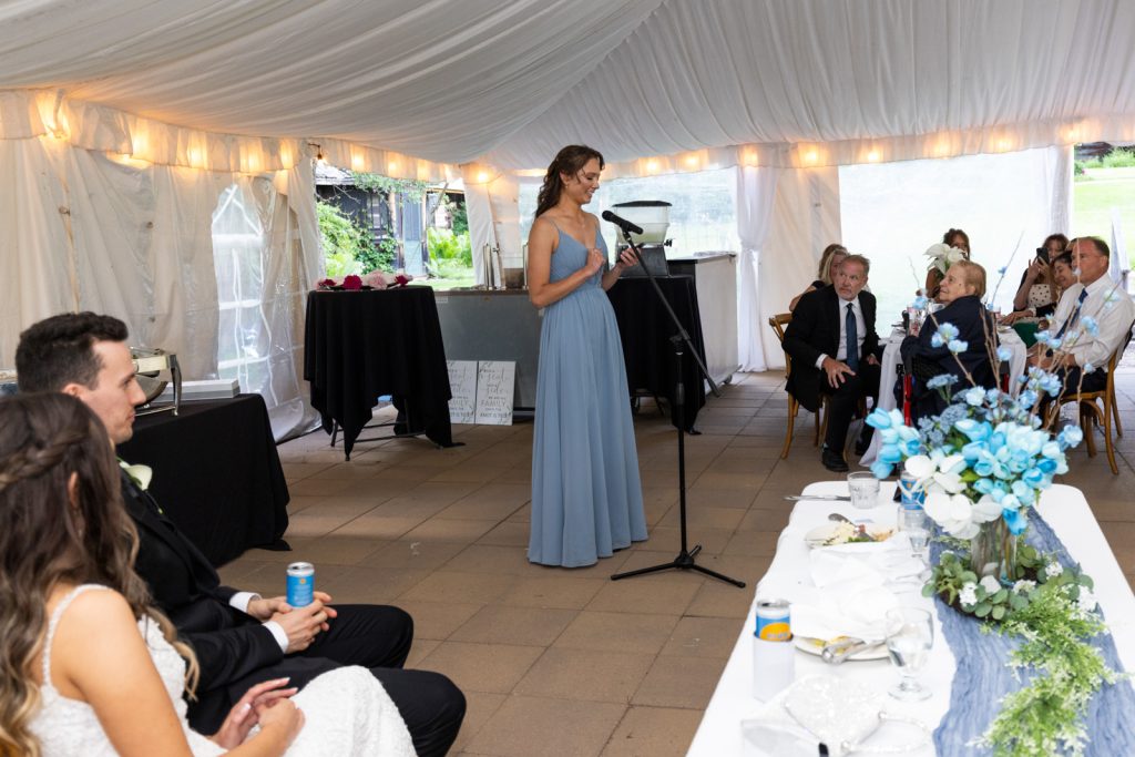 Brittany giving a speech at Stout’s Island wedding reception in Birchwood, Wisconsin.