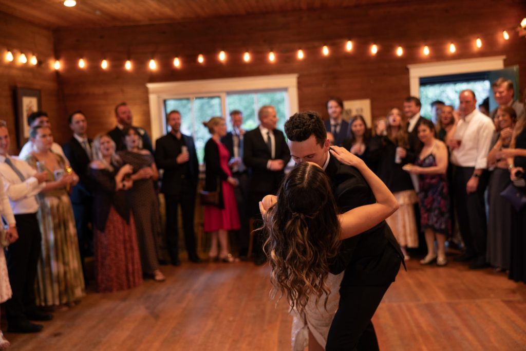 Brittany and Cole dancing at their Stout’s Island wedding reception in Birchwood, Wisconsin.