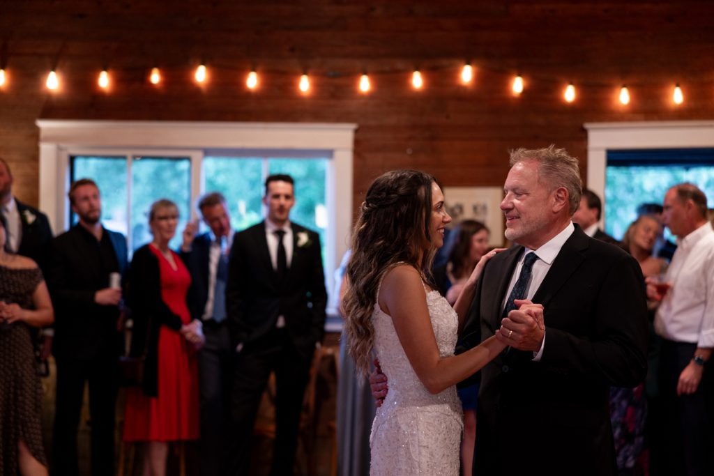 Brittany and Cole dancing at their Stout’s Island wedding reception, Birchwood, Wisconsin.