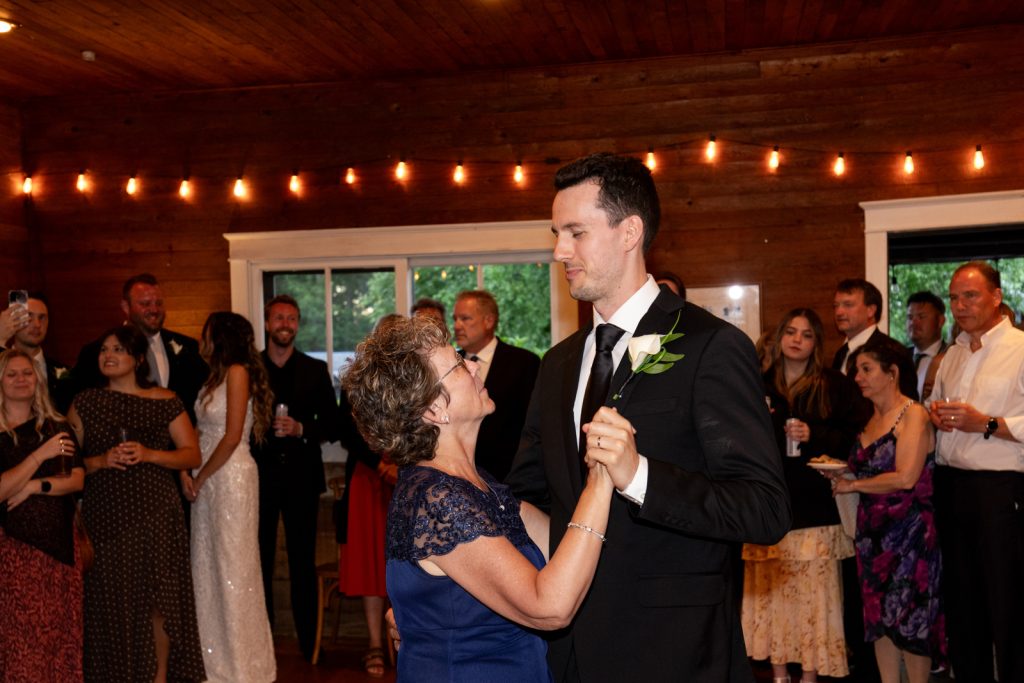 Brittany and Cole dancing at their Stout’s Island wedding reception in Birchwood, Wisconsin.