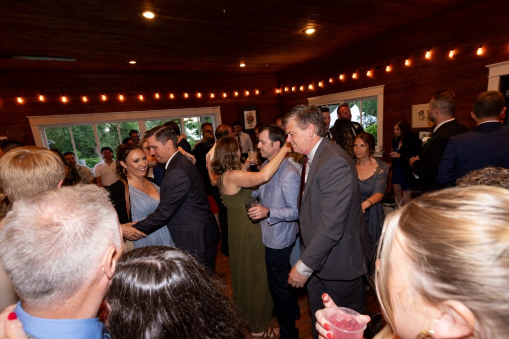 Brittany and Cole dancing at their Stout’s Island wedding reception in Birchwood, Wisconsin.