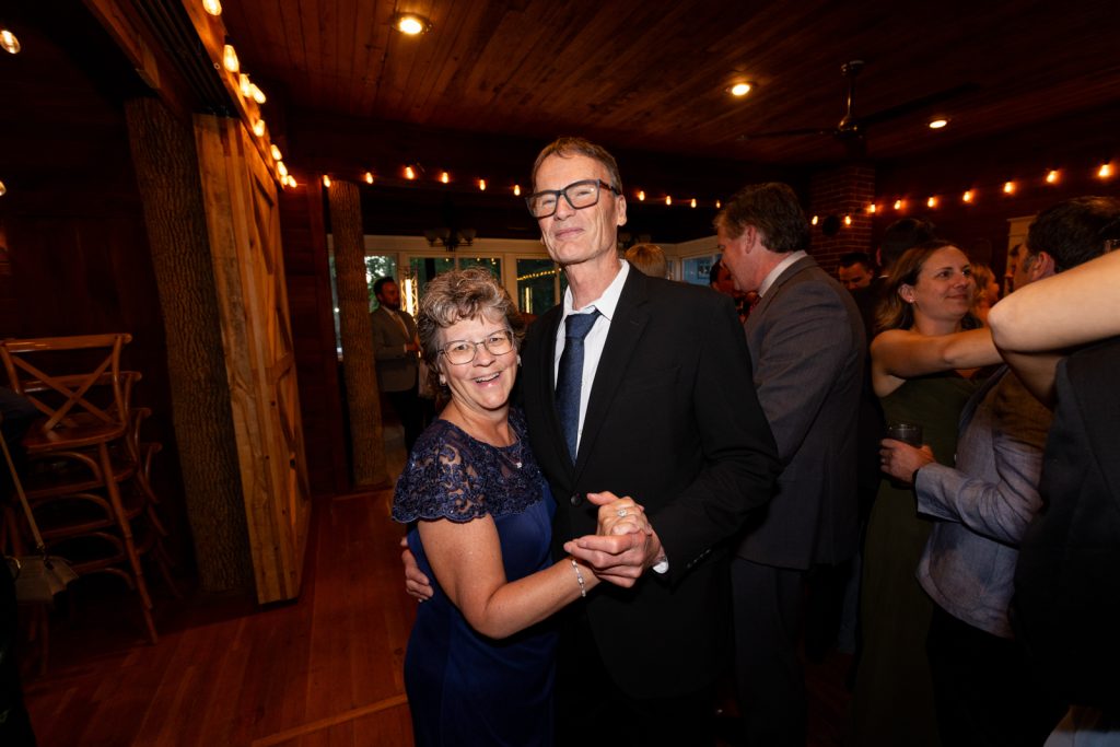 Couple dancing at Stout’s Island wedding reception in Birchwood, Wisconsin.