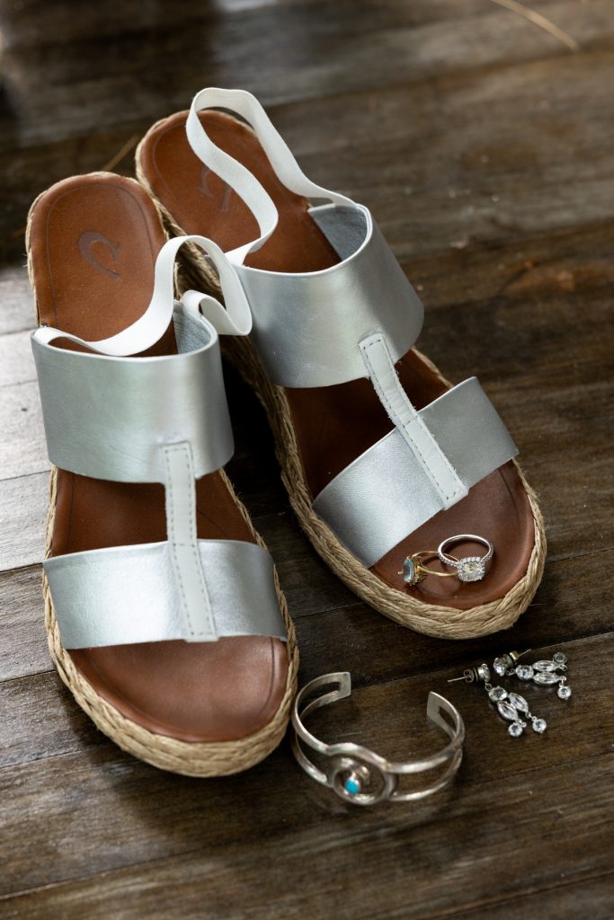 Bride's silver sandals and engagement ring detail from Hayward, WI wedding.