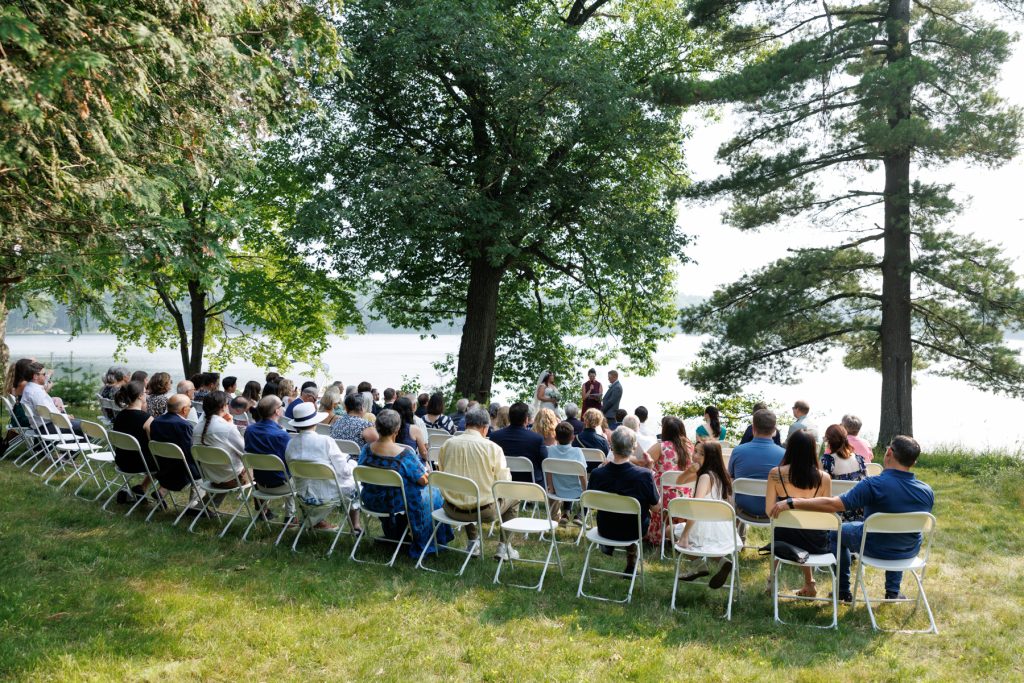 Lakefront wedding ceremony at family cabin in Hayward, WI.