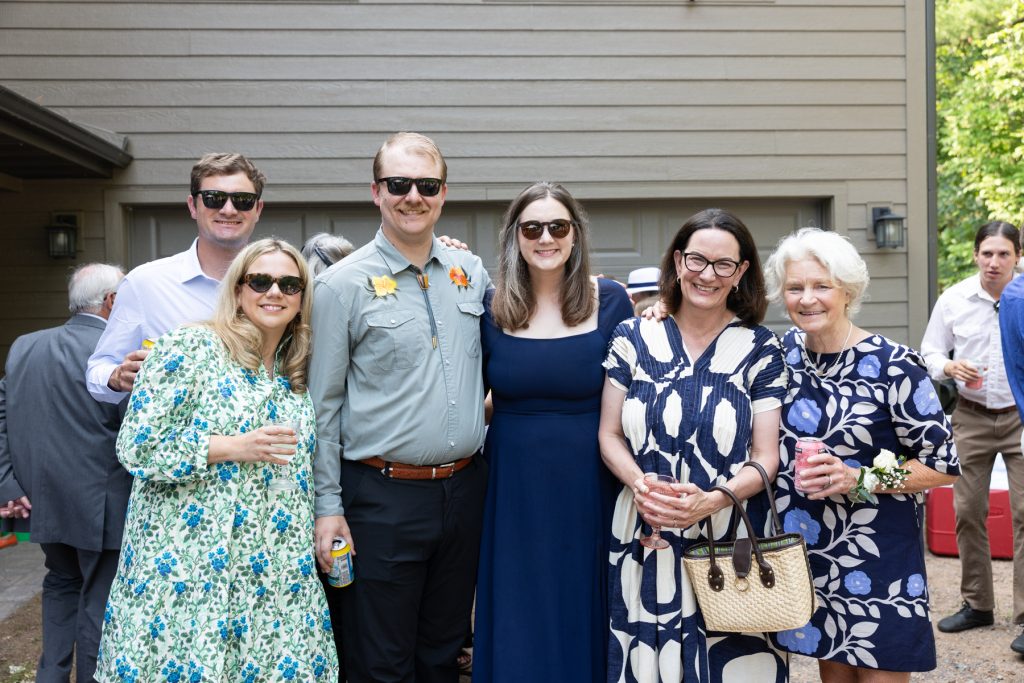 Family group portrait at a lakeside wedding in Hayward, WI.