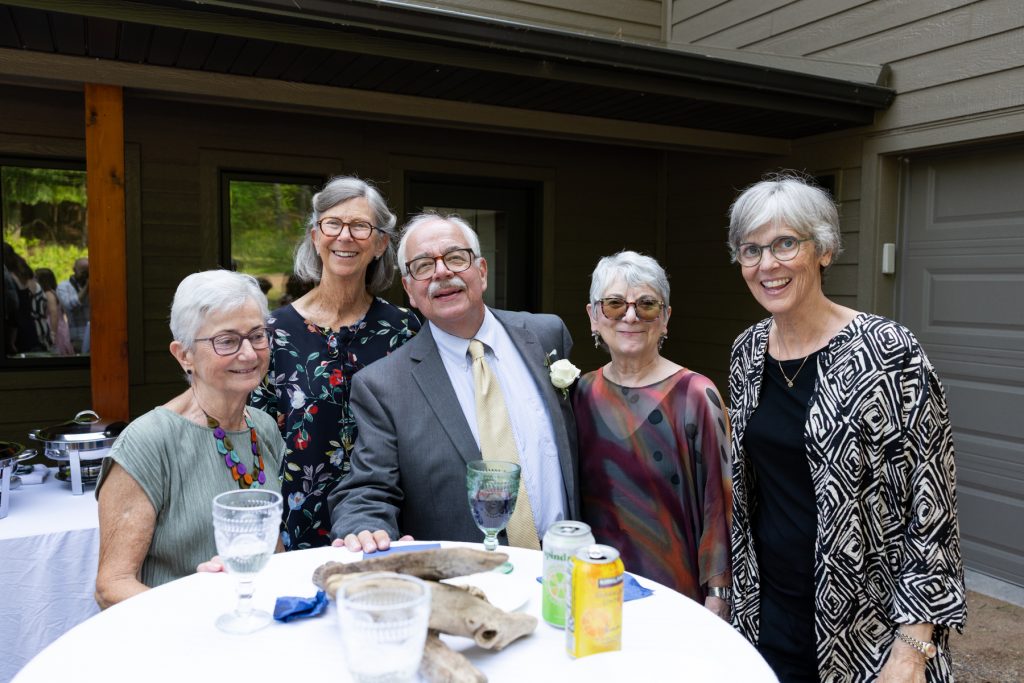 Family group portrait at a lakeside wedding in Hayward, WI