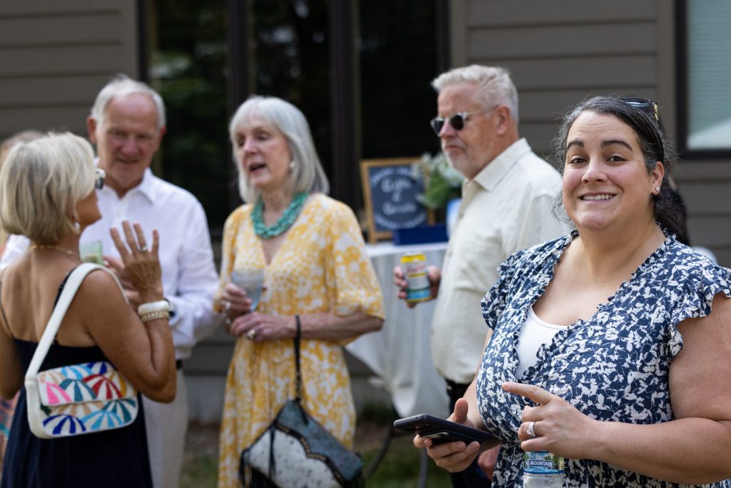 Wedding guests celebrating at a lakeside cabin in Hayward, WI.