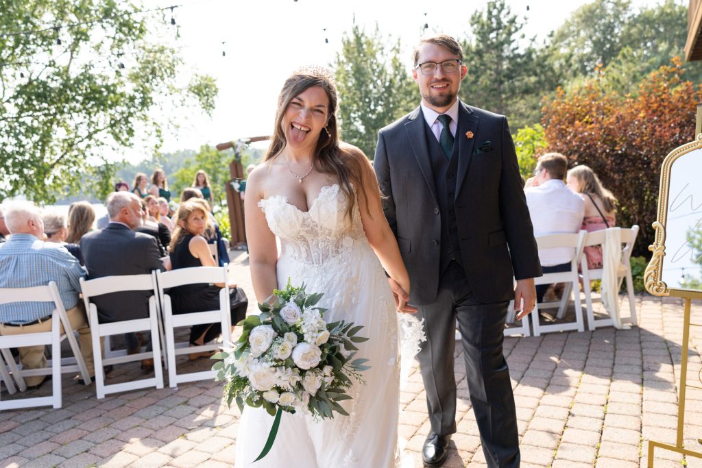 Newly married couple, the bride in a white wedding dress and the groom