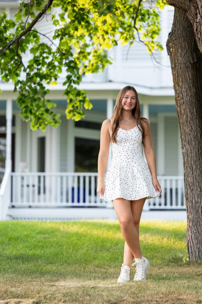 Hayward Wisconsin High School senior Abby smiles for her portrait session, captured by Superior Sunset