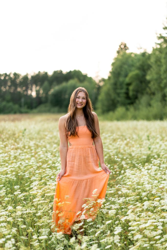 Abby Hayward, a senior from Hayward Wisconsin High School, smiles warmly while standing
