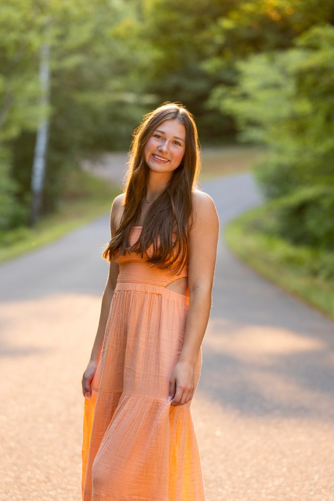 Hayward Wisconsin High School senior Abby smiles warmly during her portrait session, captured by Superior