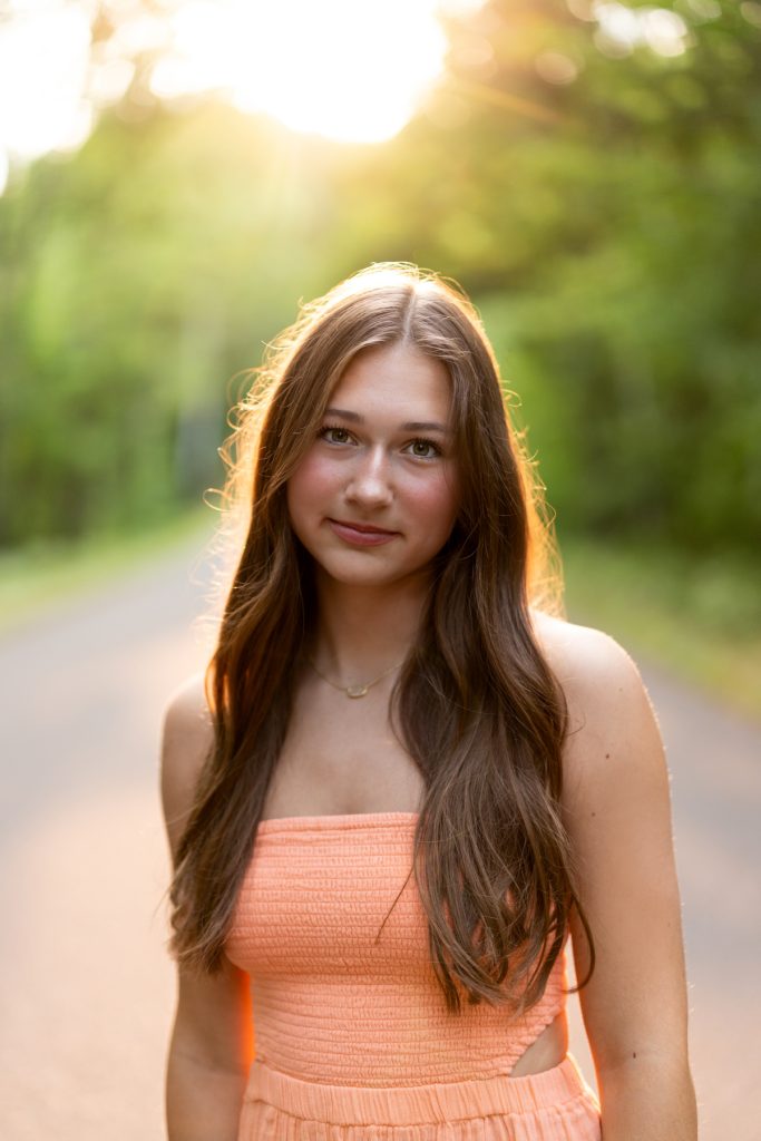 Hayward Wisconsin High School senior Abby smiles warmly during her portrait session, captured by Superior