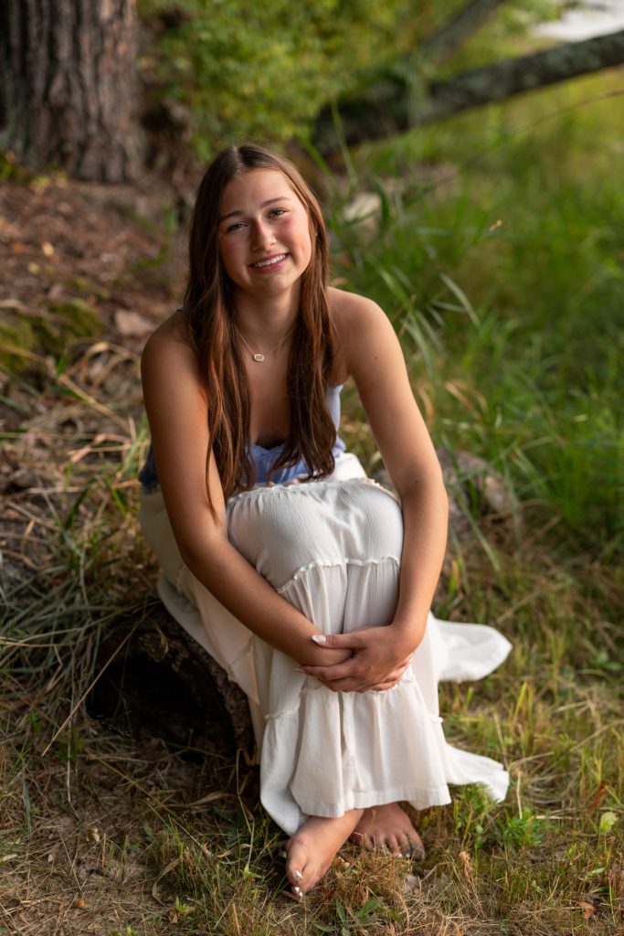 Hayward High School senior Abby poses for a portrait session in a natural setting