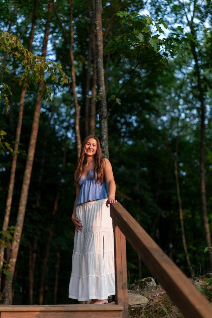 Abby Hayward, a graduate from Hayward Wisconsin High School, smiles during her senior portrait session
