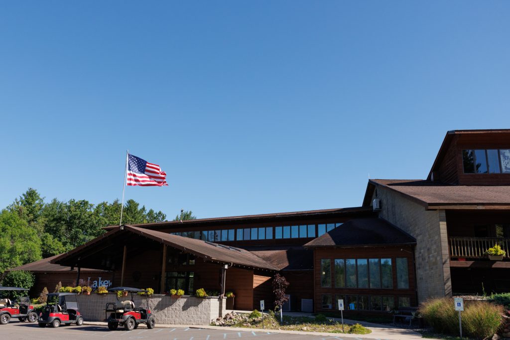 American flag waving proudly above Lakewoods Resort in Cable, Wisconsin, a beautiful destination wedding venue