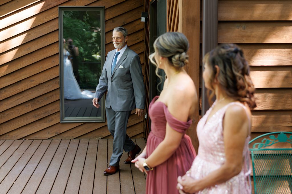 Emotional moment captured by Beau Petersen Photography: groom looking at his bride at Lakewoods Resort