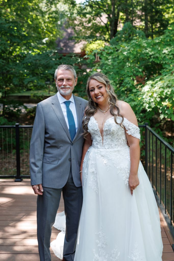 Bride and father share a joyful portrait at a Lakewoods Resort wedding in Cable, Wisconsin