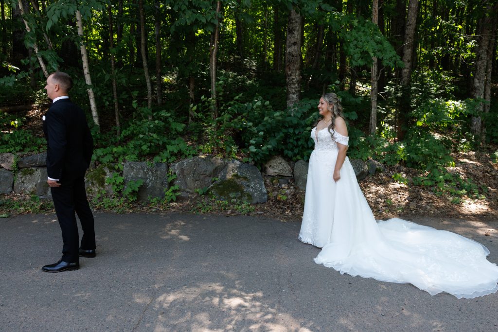 Bianca and Nick share an emotional first look at their Lakewoods Resort wedding in Cable
