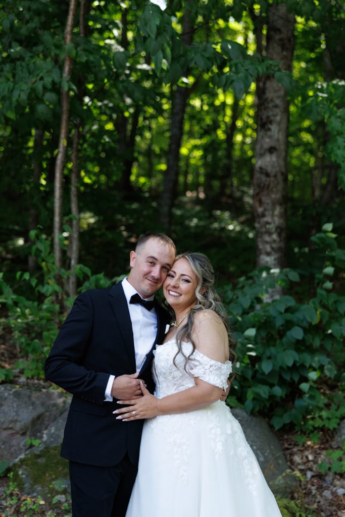 Bianca and Nick, the happy couple, share a loving moment during their Lakewoods Resort wedding