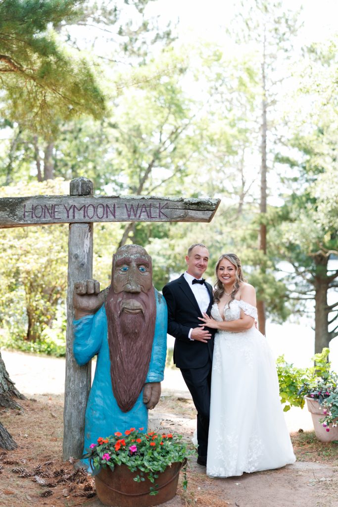 Bianca and Nick, the newlyweds, pose for a portrait at Lakewoods Resort in Cable, Wisconsin