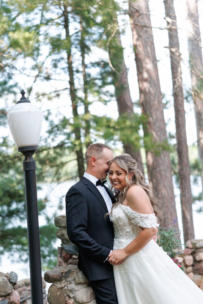 Bianca and Nick, the happy couple, share a tender moment at their Lakewoods Resort wedding