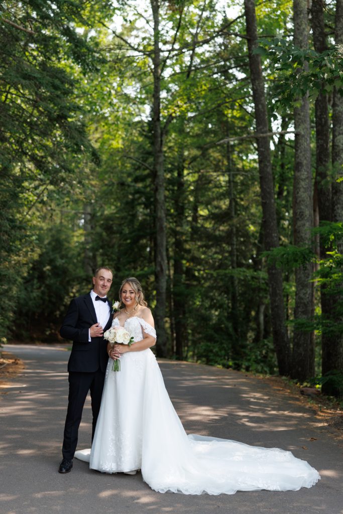 Bianca and Nick, the newlyweds, pose for a portrait during their destination wedding at Lakewoods