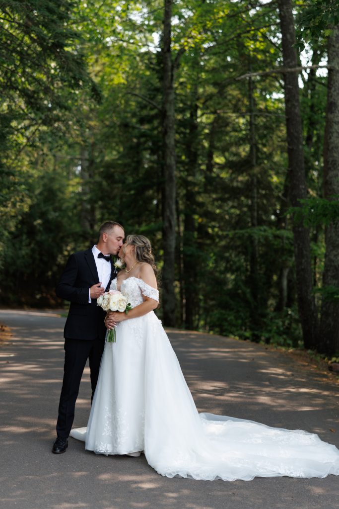 Bianca and Nick, the happy couple, share a tender moment during their destination wedding