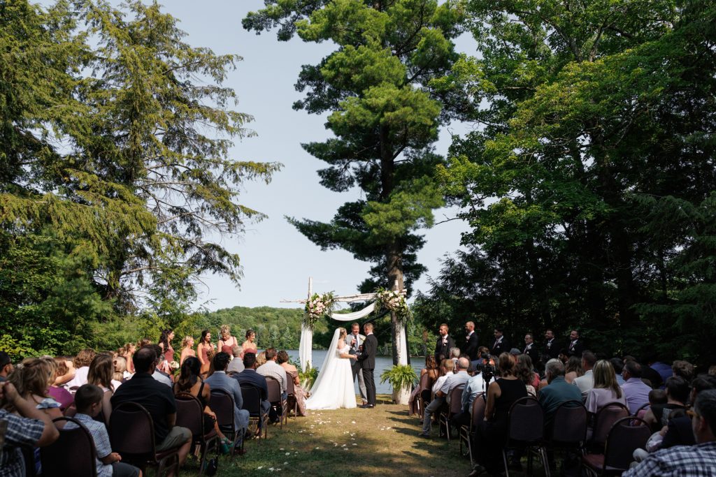 Bianca and Nick's Lakewoods Resort wedding ceremony captured by Beau Petersen Photography and Bethany, featuring
