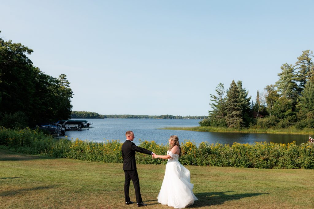 Bianca and Nick, the newlyweds, dance together at their Lakewoods Resort wedding in Cable, Wisconsin