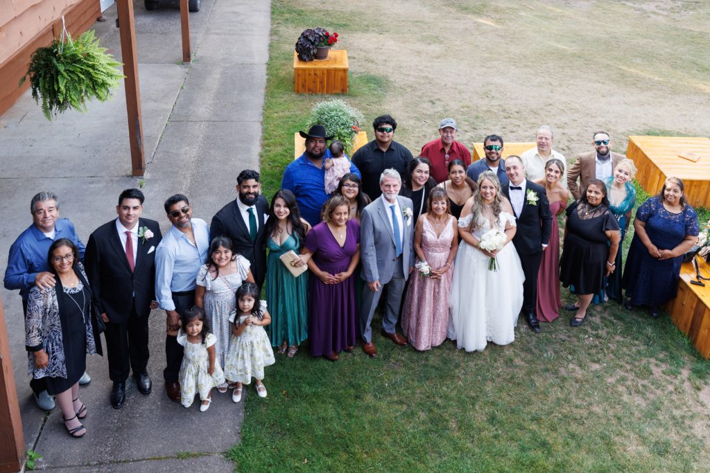 Large group portrait of wedding party and guests at a Lakewoods Resort destination wedding