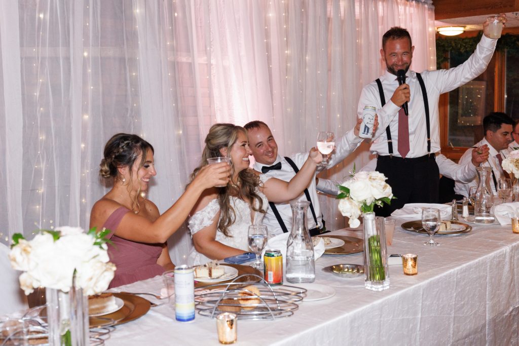 Bride and groom Bianca and Nick celebrate with guests at their Lakewoods Resort wedding
