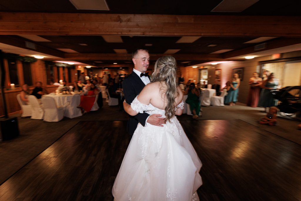 Bianca and Nick share a first dance at their Lakewoods Resort wedding in Cable, Wisconsin