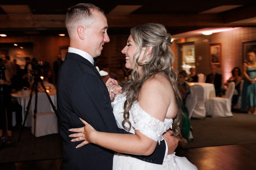 Bianca and Nick share a loving moment during their first dance at Lakewoods Resort wedding