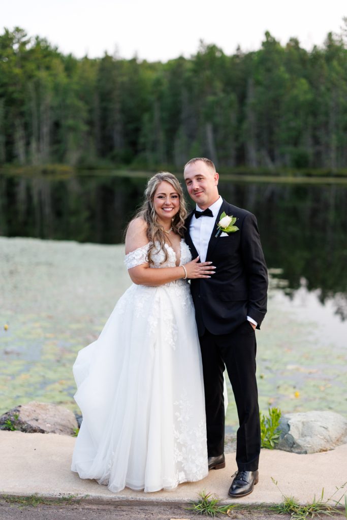 Bianca and Nick, the newlyweds, pose for a portrait during their Lakewoods Resort wedding