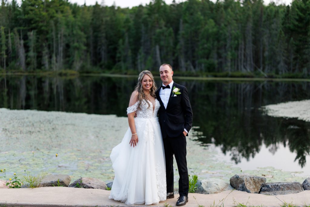 Bianca and Nick, the happy couple, pose for wedding photography at Lakewoods Resort on Lake