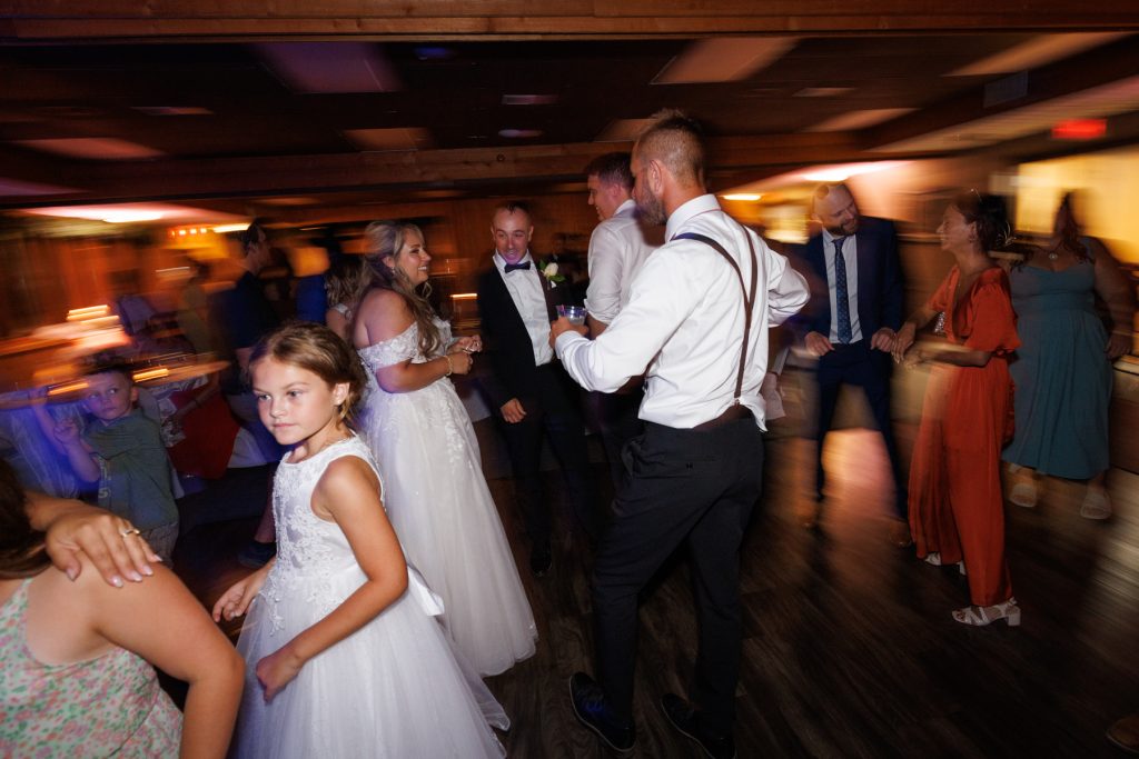 Bianca and Nick, the Lakewoods Resort wedding couple, celebrate with guests on the dance floor