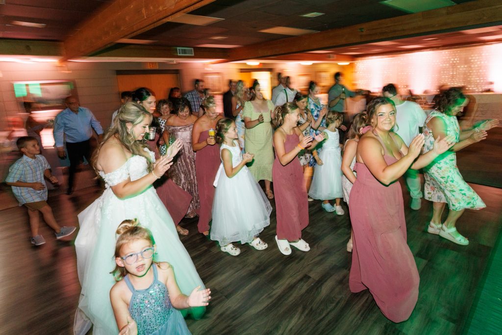 Wedding guests celebrating at Lakewoods Resort in Cable, Wisconsin, captured by Beau Petersen Photography